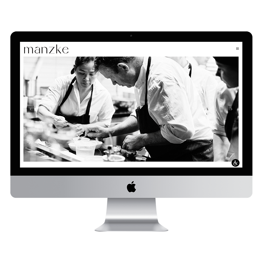 imac displaying the website design for manzke restaurant in los angeles designed by andrew eastman